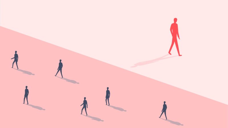 Red figure walks apart from blue figures